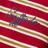 This close-up of the Mini Boden House Breton in red better shows the word “Gryffindor” written in blue script in the front pocket area. It retails between £20 and £22.