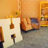 A miniature Hufflepuff common room looks cozy and inviting during a Back to Hogwarts event at the University of Arizona.