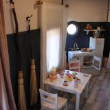 The broomstick-decorated dining area