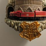 The Hogwarts Express and crest on the wall clock