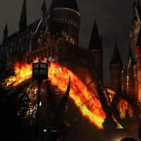 Inferi create a fiery wall up the sides of the castle in “Dark Arts at Hogwarts Castle.”