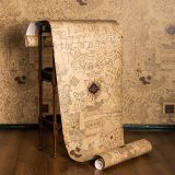 A roll of MinaLima’s Marauder’s Map wallpaper features the layout of Hogwarts Castle.