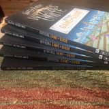 “Harry Potter: Wizards Unite: Official Game Guide”, fanned-out stack