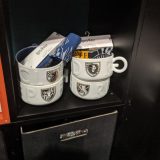 House-themed mugs are available at the PopMinded by Hallmark booth.