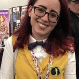 This Newt Scamander cosplay at New York Comic Con is completed by the Pickett in her pocket.