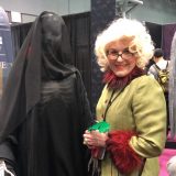 A mother/daughter team cosplaying as Rita Skeeter and a Dementor at New York Comic Con 2019!