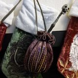 Hermione’s bag, wand, and stockings