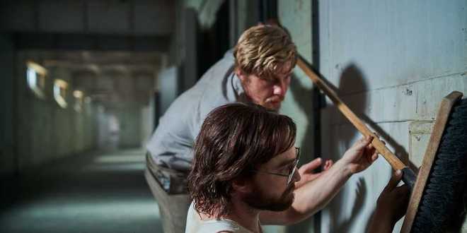 Daniel Radcliffe and Daniel Webber in a scene from "Escape from Pretoria".