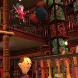 A Dolores Umbridge toy is seen balancing its way across a wire in Weasleys’ Wizard Wheezes.