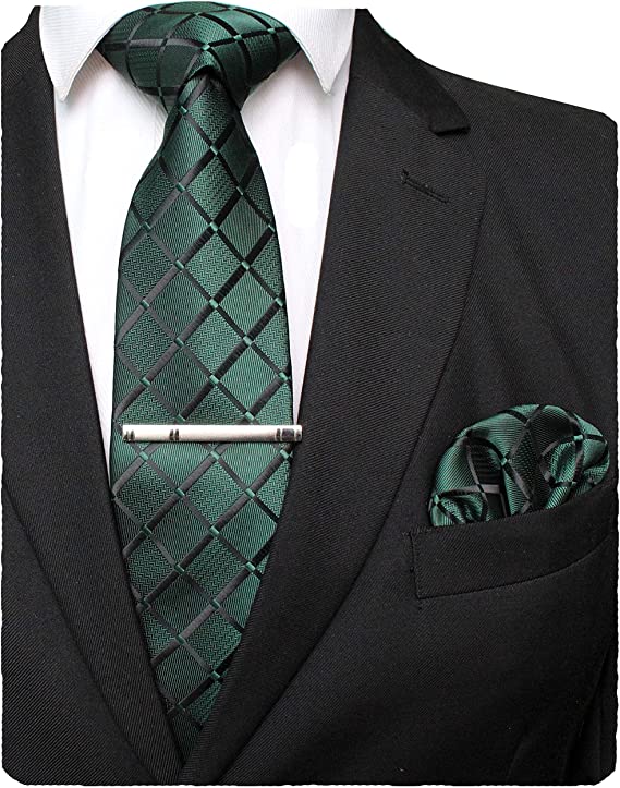 Green tie and pocket square with tie clip
