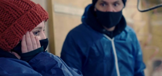 Evanna Lynch (Luna Lovegood) is pictured at the left in a black face mask and red hat as she visits a chicken factory farm in the United Kingdom with VFC.