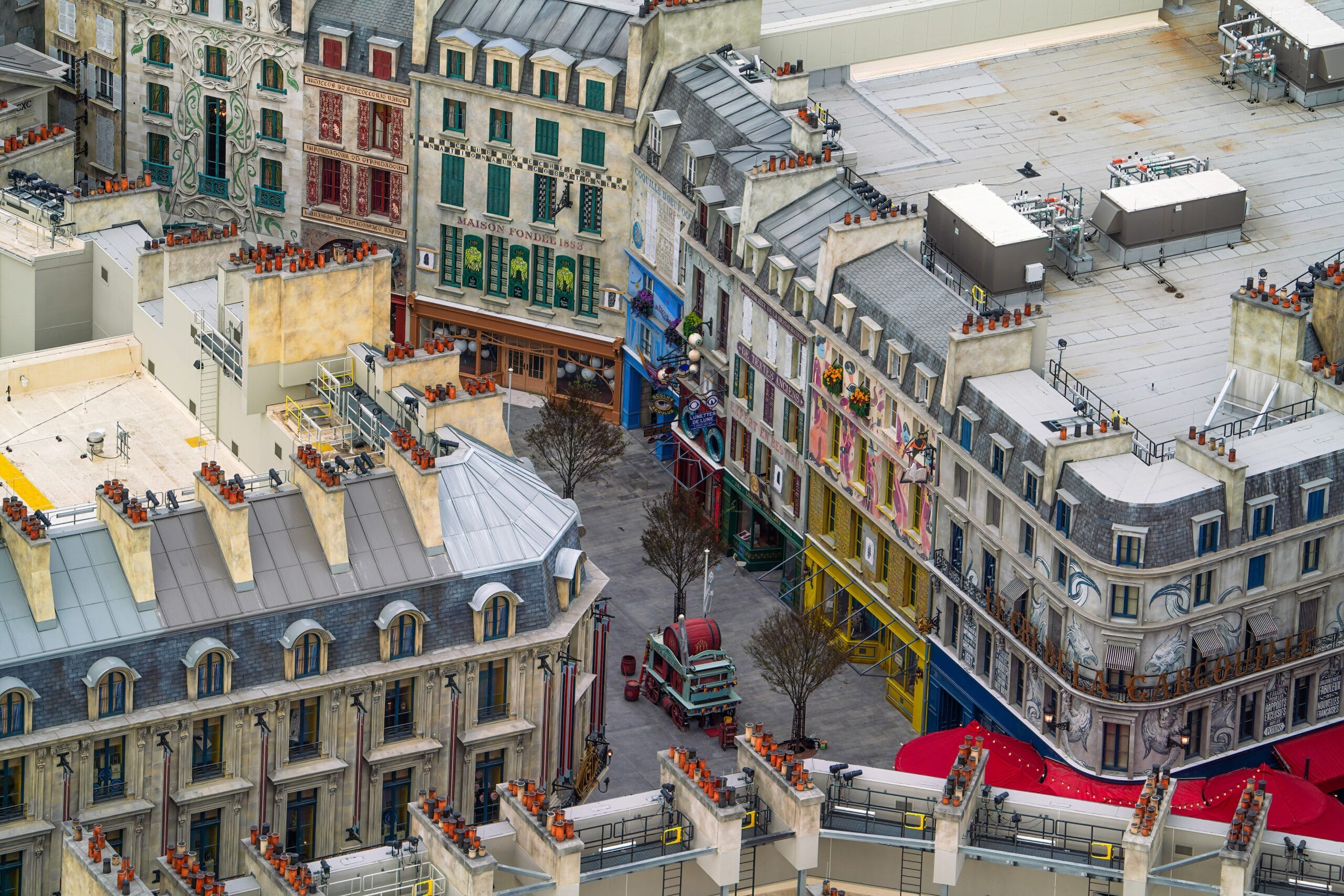 This street is lined with all kinds of magical facades, bearing names like Lunette de Lune, De Textes Anciens, Oculus Regulus, Expert en Bestiaux, and Librarie Magillard. (Source: @bioreconstruct/Twitter)