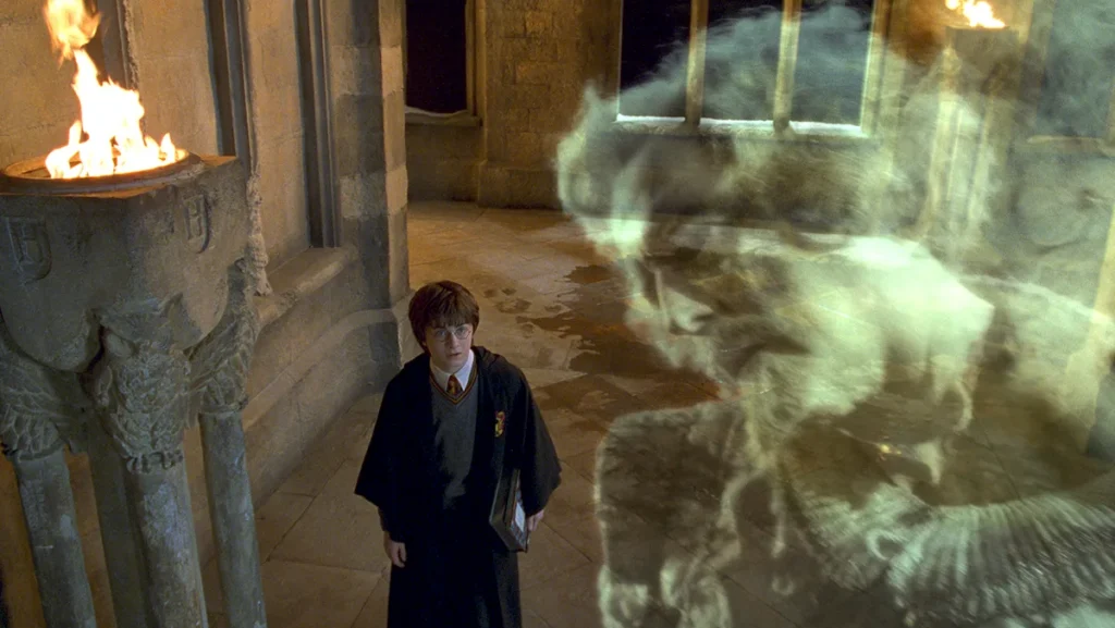 Harry Potter looking at the ghost of Nearly Headless Nick