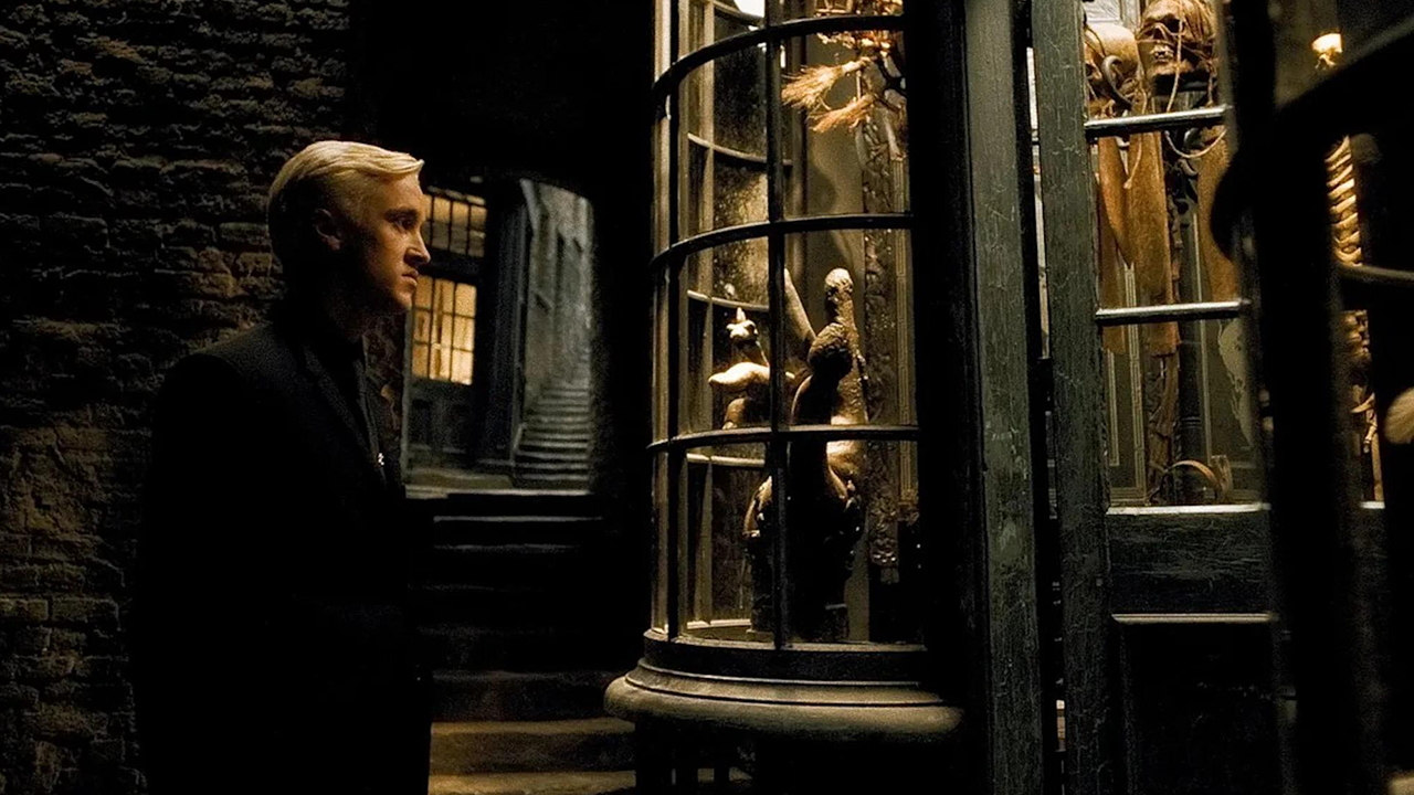 Lucius Malfoy in Knockturn Alley, associated with the trade in Dark magical objects